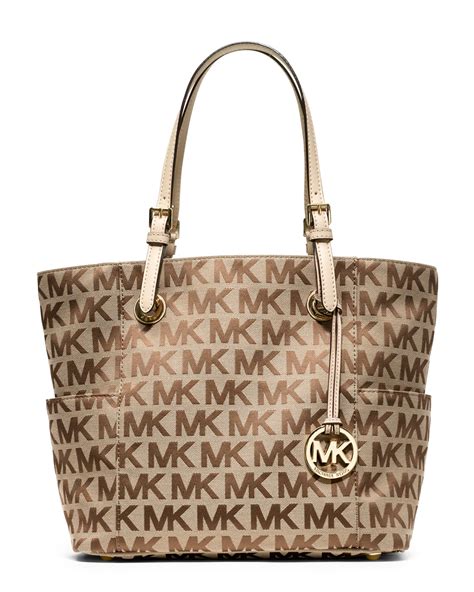 does michael kors produce material bag|Michael Kors tote bag sale.